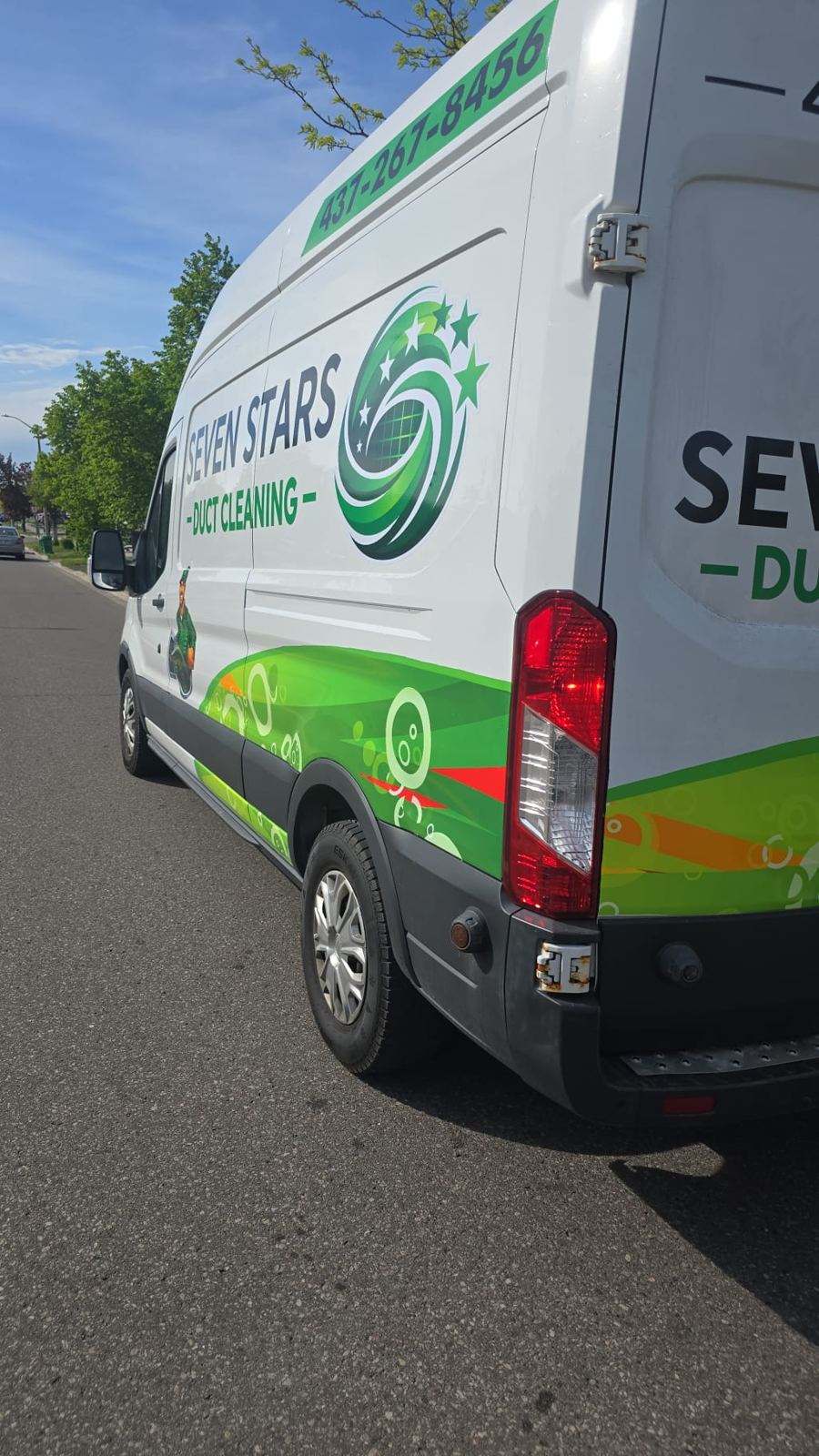 Rear-angle view of Seven Stars Duct Cleaning Ford Transit service van